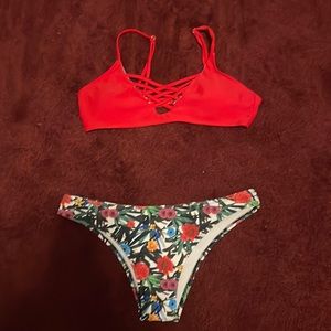 Lightly worn, red and flower print bikini, a little bit cheeky
